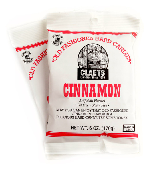Reddish-brown Claey's Cinnamon Hard Candy Drops in an old fashioned 6oz bag, approx. 42 pieces.