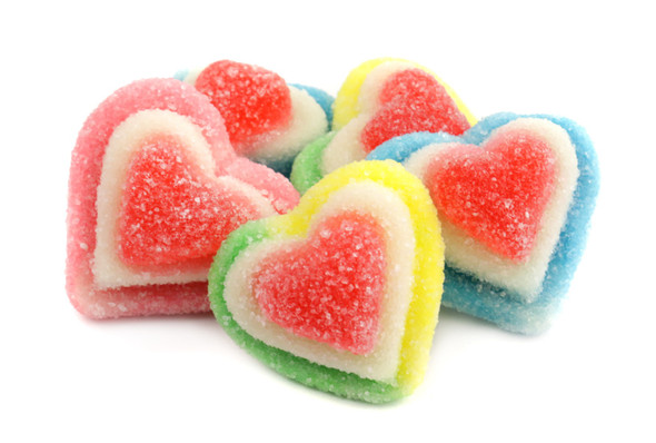 6-count, 4.4 LB bulk bag of triple-layer rainbow gummy hearts. Sugared, dimensional, colorful candy hearts.