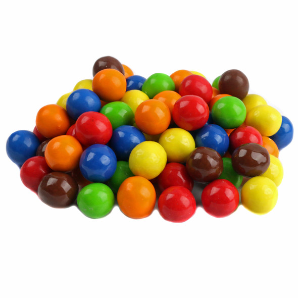 Vibrant rainbow Sixlets candy, a pile of classic bite-sized chocolate pieces with crisp shells.