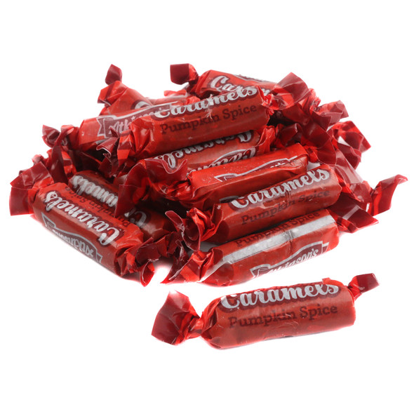 Atkinson Pumpkin Spice Caramels, individually wrapped in warm orange and reddish-brown. Sweet cinnamon, nutmeg, clove fall candy.