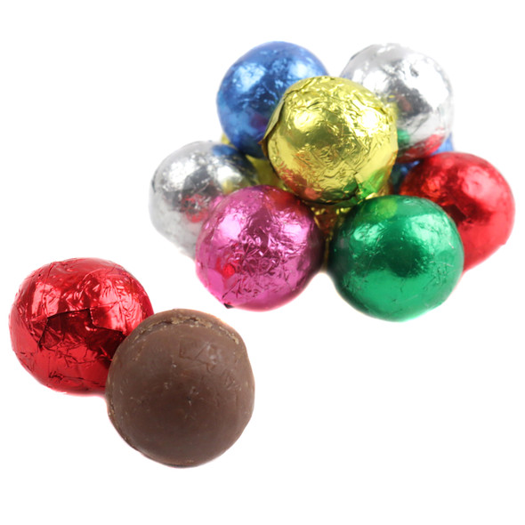 Madelaine Milk Chocolate Crispy Christmas Balls, 80 per pound, in vibrant jewel-toned Christmas foil wrappers.