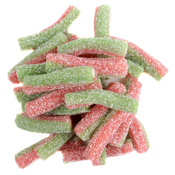 A bulk display of Fini Sour Strawberry Apple Licorice Twists showing the vibrant, dual-colored red and green chewy candy straws