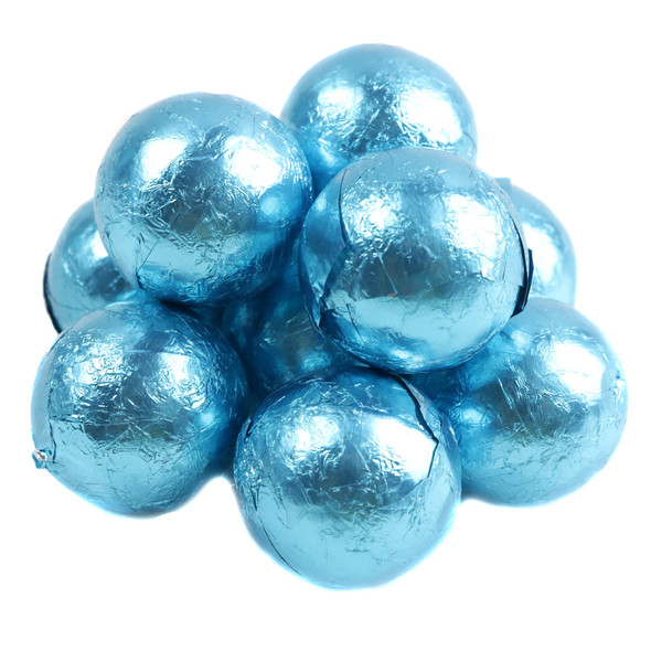 A bulk arrangement of round milk chocolate balls individually wrapped in shiny light blue metallic foil