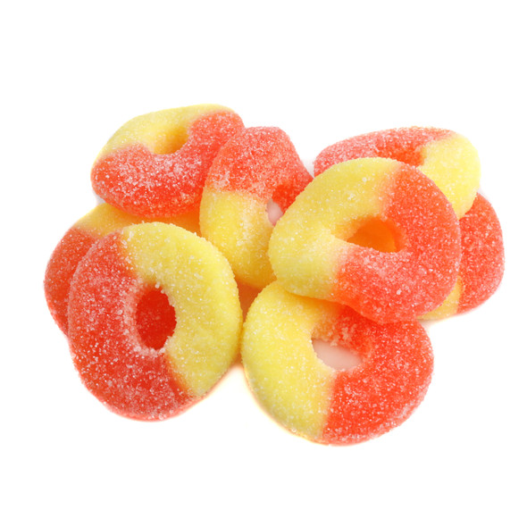 Orange and yellow gummy Peach Rings candy, with a sour sugar coating. Approximately 60 Albanese Peach Rings per pound.