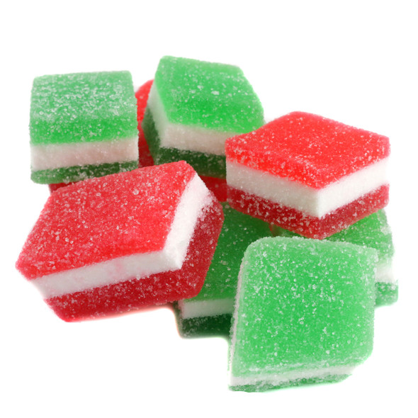 individual unwrapped green and red jelly fruit bites, highlighting their soft, tender texture and bright colors