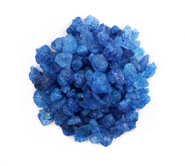 Vivid blue raspberry rock candy crystals, striking blue color, sweet fruity flavor, perfect for desserts and toppings.