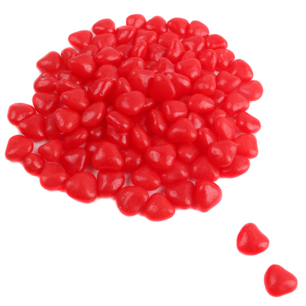 Tiny, red, heart-shaped Cinnamon Heart Imperials, fiery cinnamon flavor, approximately 1,400 candies per pound.