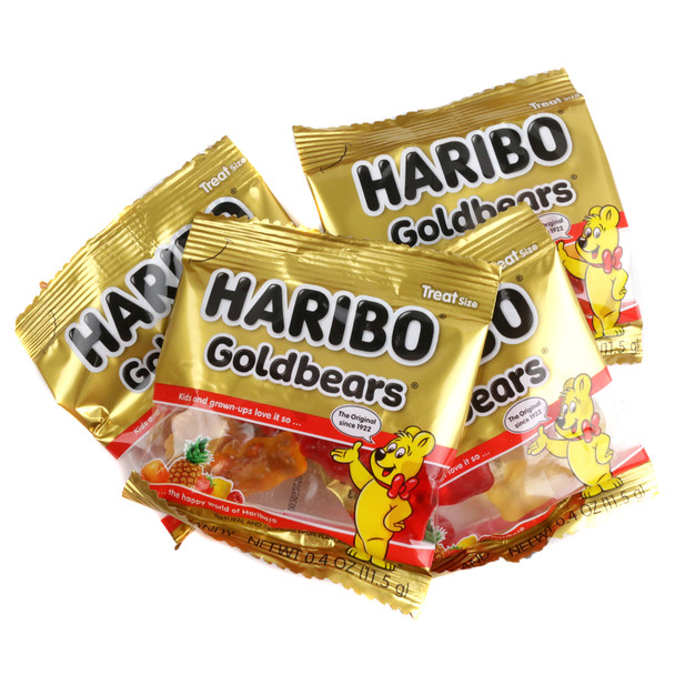 54 Haribo Gold Bears mini packs, colorful fruity gummy candy, individual small gold packets.