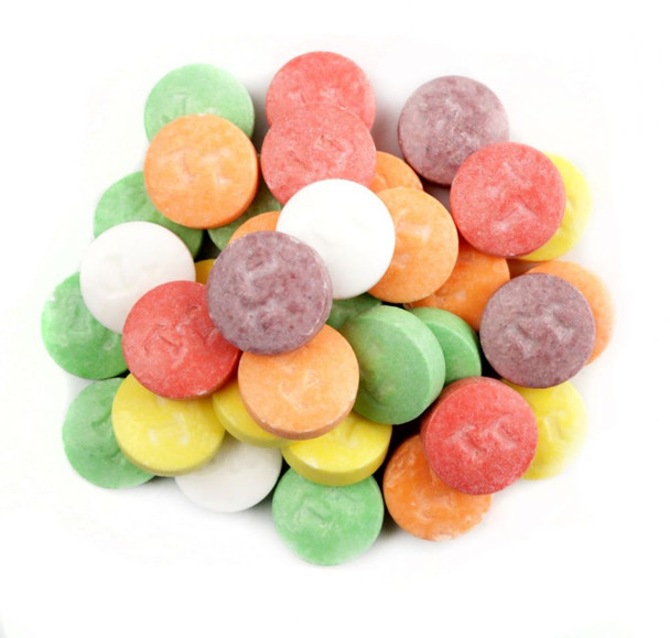 Tootsie Tarts, colorful fruit-flavored pressed candy, approx. 280 pieces per pound. Vibrant yellow, orange, red, green, purple.