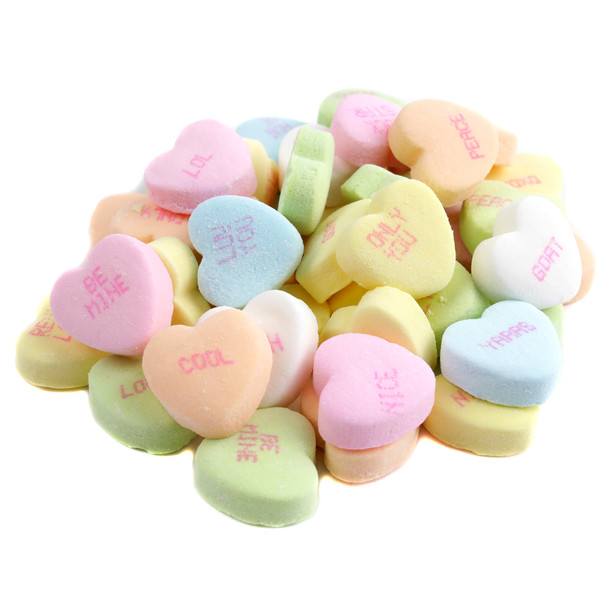 Small pastel rainbow Valentine's Conversation Hearts, approx. 300 per pound, featuring flirty phrases like So Nice, Be True.