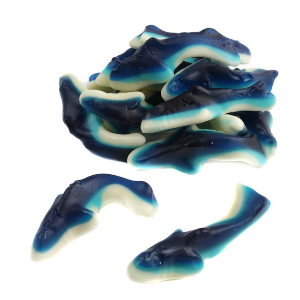 Blue and white gummy sharks, 2.5 inches long, 55 per lb. Soft, sweet blueberry flavored candy.