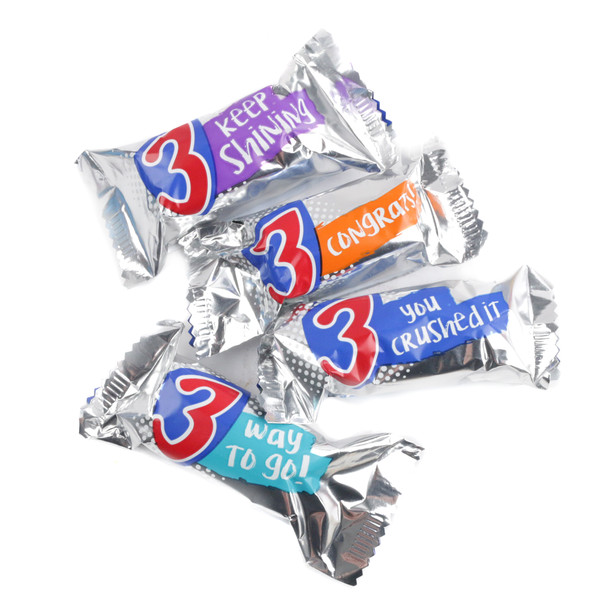 Multiple 3 Musketeers Fun Size candy bars, bite-sized, rich milk chocolate, fluffy nougat, silver wrappers.