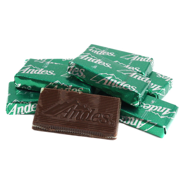 Green Andes Mints, individually foil-wrapped, with visible layers of refreshing mint and rich milk chocolate. Approx 80 per pound.