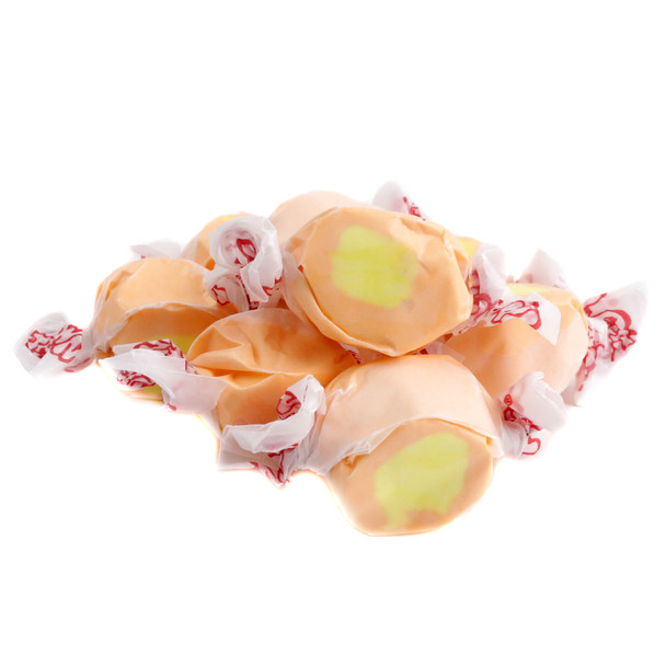 Creamy whipped Mango Salt Water Taffy, approximately 65 yellow-orange pieces per pound. Made in USA.