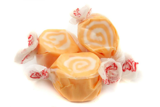 Orange and white swirled Salt Water Taffy, approximately 65 pieces per pound, delicious orange creme flavor.