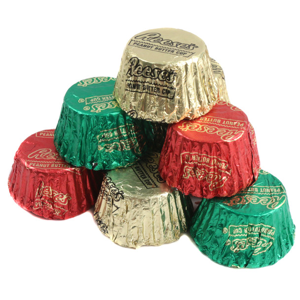 Christmas Reese's Peanut Butter Cups, mini chocolate peanut butter candy, individually foil wrapped in assorted holiday colors.