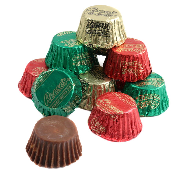 Mini Christmas Reese's Peanut Butter Cups, about 48 per pound, in assorted red, green, silver foil wrappers.