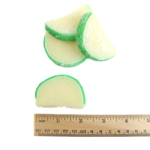 Unwrapped 5LB box of green pear jelly candy fruit slices, sugar-dusted, sweet, soft, juicy.