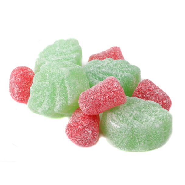 Green spearmint leaf and red cinnamon berry Christmas gum drops, lightly sprinkled with sugar, soft texture.