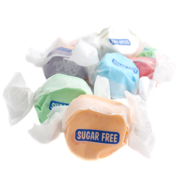 Colorful assortment of approximately 65 sugar free salt water taffy pieces. Apple, banana, blue raspberry, strawberry, orange, vanilla.