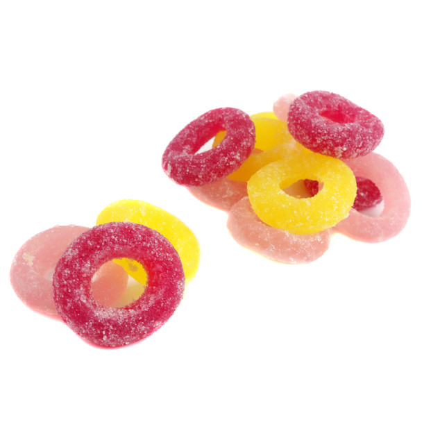 Non-GMO sour lemonade gummy rings. Assorted classic yellow, strawberry pink, and pomegranate rings, approx 65 chewy pieces.