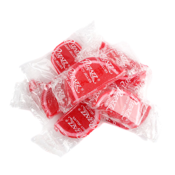 Individually wrapped raspberry jelly fruit slices, vibrant red with white edges, sugar-coated, approx 32 per pound.