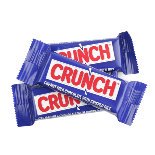 Blue packaged Nestle Crunch Fun Size candy bars, approx. 35 pieces per pound. Milk chocolate with crunchy rice crisps.