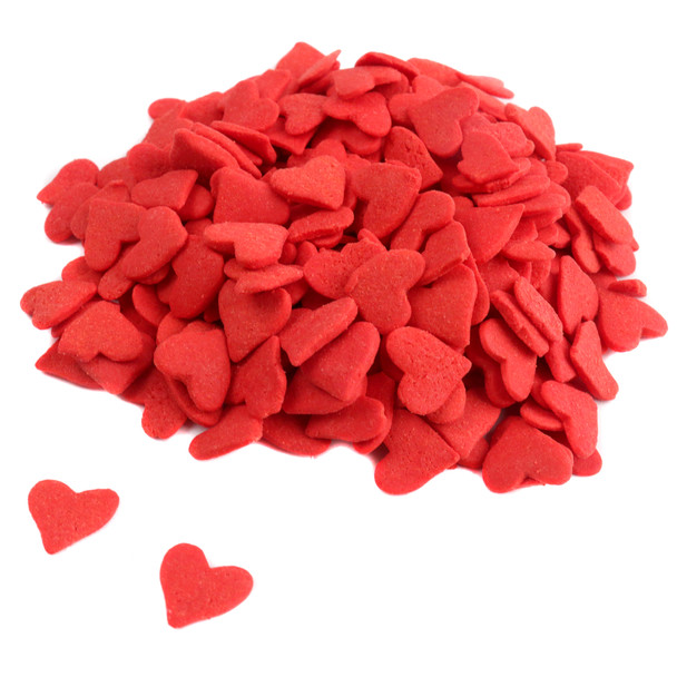 Red heart-shaped candy sprinkles, 1/4 inch, for decorating desserts, cupcakes, cookies, ice cream.