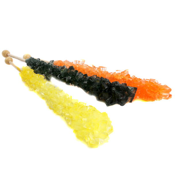 12 wrapped Halloween rock candy sticks, assorted orange, black cherry, and banana colors.