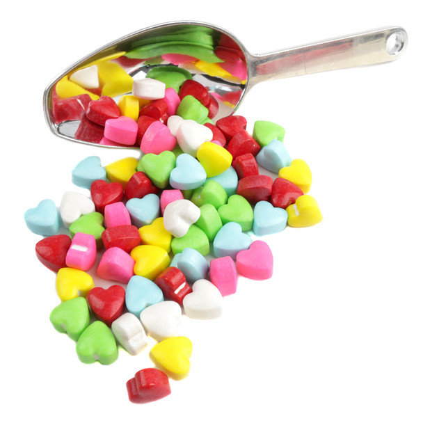 Approximately 790 small mini rainbow candy hearts, vibrantly colored pressed candy assortment per pound.