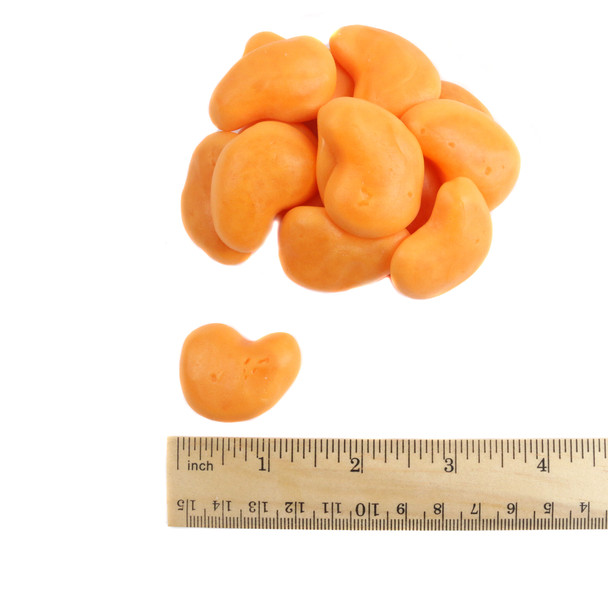 Orange, yellow Gummy Filled Spicy Mangos, bulk candy with sweet and spicy flavor, approx. 70 pieces per pound.
