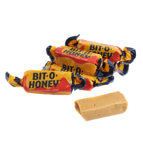 Bit O Honey candy, golden chewy taffy with roasted almonds. Approximately 60 pieces per pound. Old-fashioned Pearson's candy.