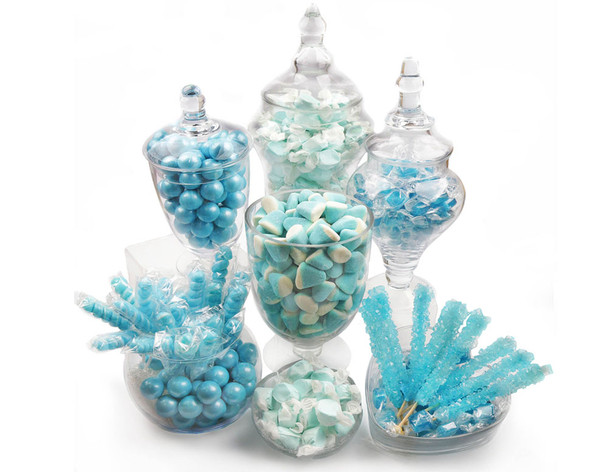 Oh Boy Baby Shower candy buffet, featuring assorted blue and light blue rock candy sticks, lollipops, taffy, and chocolate balls.
