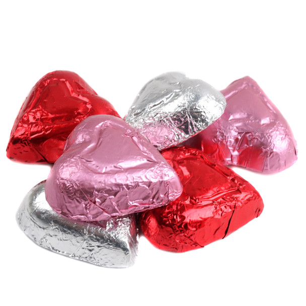 Colorful foil-wrapped Madelaine mini chocolate hearts for Valentine's Day. Approx. 55 pieces per pound.