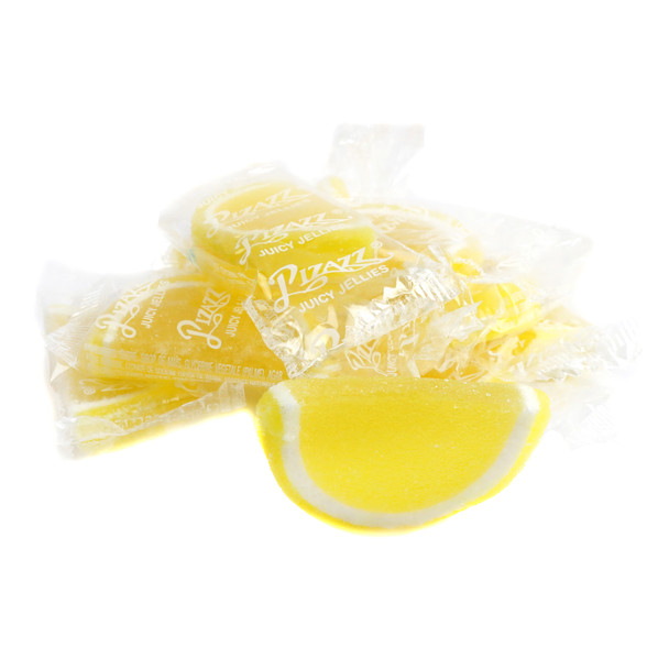 Vibrant yellow lemon jelly fruit slices, sugar-drenched, individually wrapped. Approx 32 Cavalier Candies per pound.
