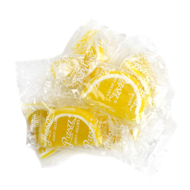 Cavalier Candies, individually wrapped yellow lemon jelly fruit slices, sugar-drenched, yellow & white edges. Bulk.