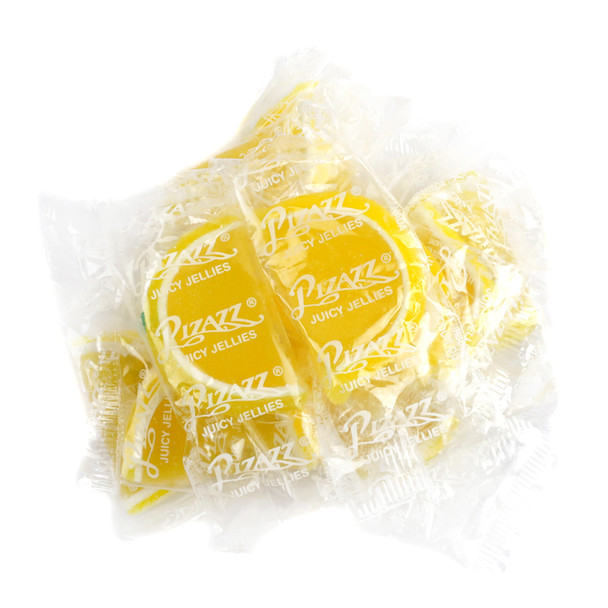 Yellow & white lemon jelly fruit slices, sugar-drenched & individually wrapped, approximately 32 per pound.