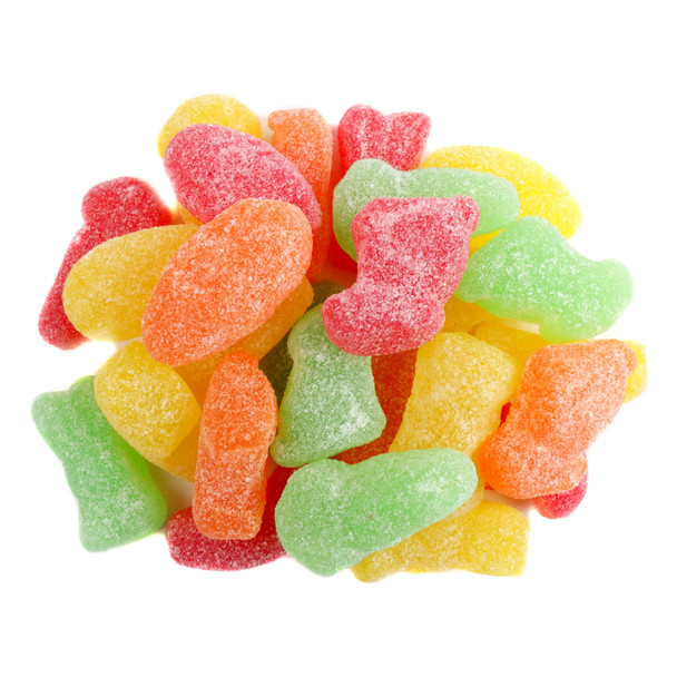 Vibrant orange, red, yellow, green jelly bunnies, eggs, carrots mix. Assorted fruit-flavored Easter candy.