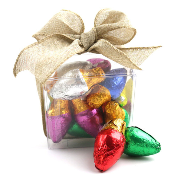 1/2 lb solid milk chocolate Madelaine Christmas lights candy treat cube, tied with festive bow.
