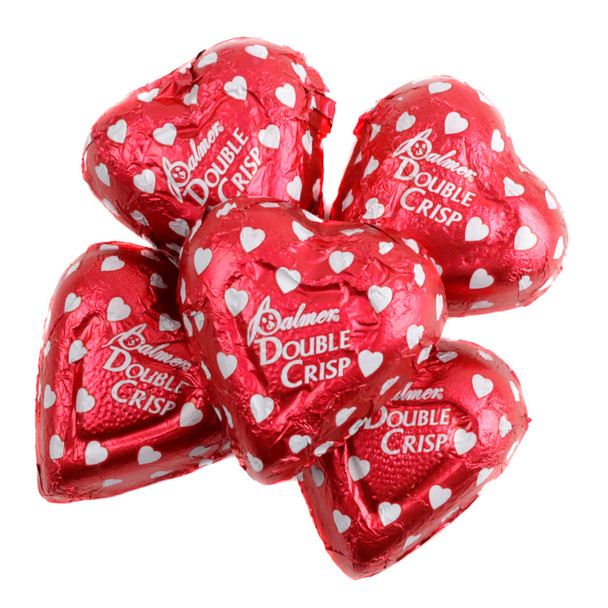 Milk chocolate Double Crisp Valentine hearts, individually wrapped in bright foils, crispy rice, approx. 48 per pound.