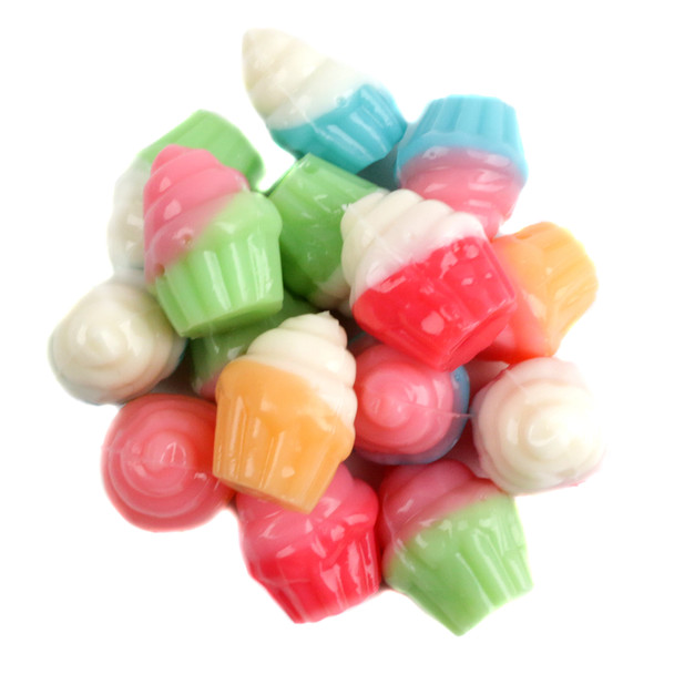 Delicious 3D gummy cupcakes, assorted flavors, pink or white frosting, adorable wrappers. Approx 55 per pound.