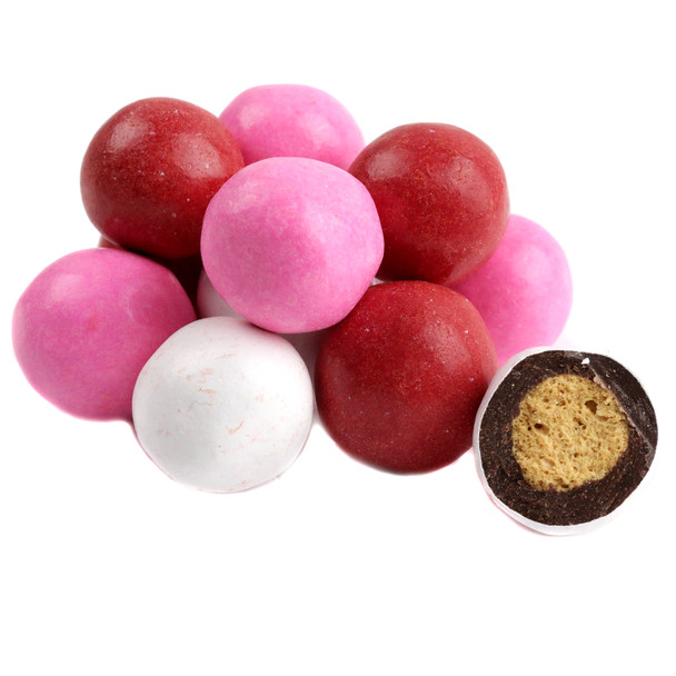 Red, white, pink Valentine Malt Balls, candy-coated dark chocolate treats for Valentine's Day.