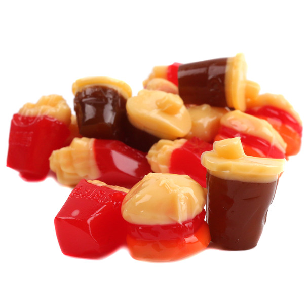 Assorted 3D gummy fast food candies, featuring colorful burgers, golden fries, and fizzy sodas.