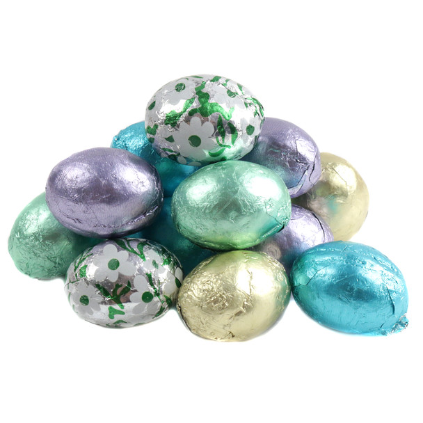 Madelaine white chocolate Easter eggs, individually wrapped in colorful Italian foils, solid, creamy, approx 63 per pound.