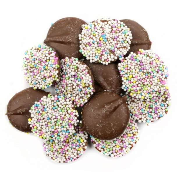 Milk Chocolate Easter Nonpareils, creamy chocolate discs with pretty pastel nonpareils on top, 130 per pound.