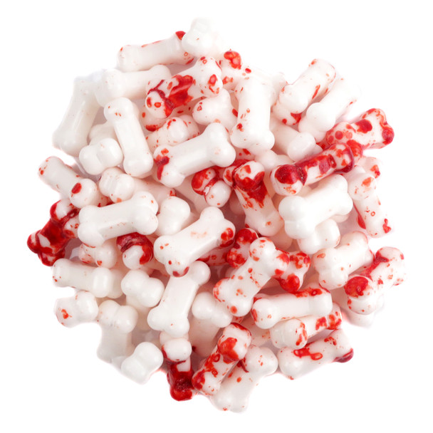 Candy Bloody Bones, bone-shaped white pressed candies with red splatter, approx. 350 per pound, for Halloween.