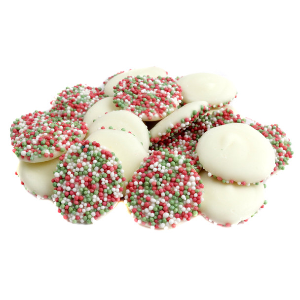 Christmas White Chocolate Nonpareils, white discs with festive red, green, white nonpareils on bottom.