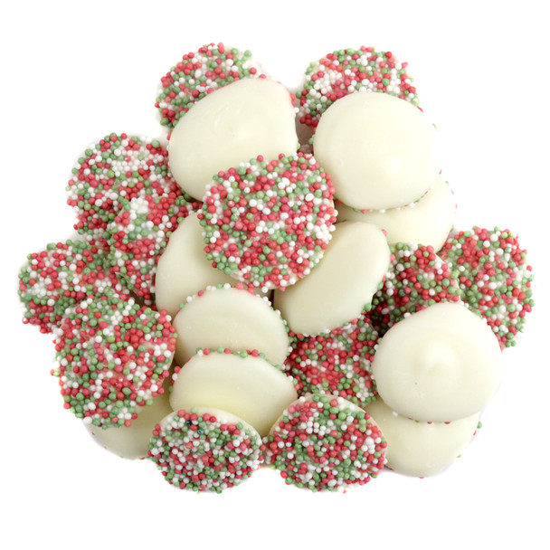 Christmas White Chocolate Nonpareils, sweet white discs with festive red, green, white sprinkles, approx 130 pieces per pound.