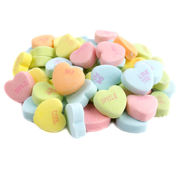 Vibrant rainbow Sour Conversation Hearts, tart, heart-shaped, printed with flirty phrases, perfect for Valentine's Day.