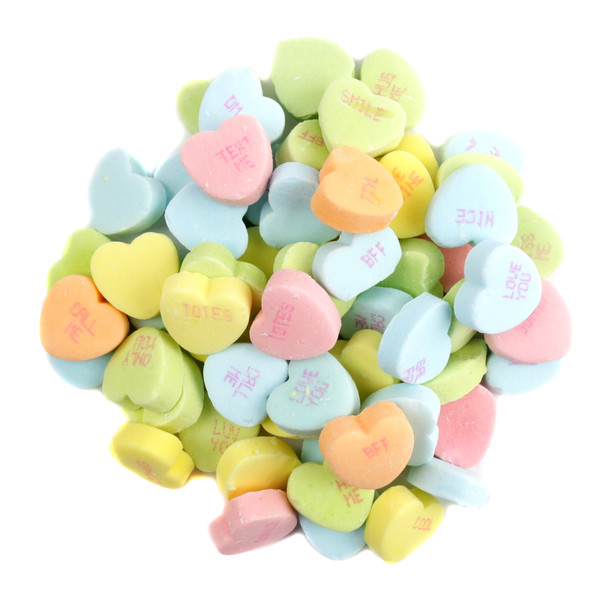 Rainbow, tart Sour Conversation Hearts, heart-shaped Valentine's Day candy with flirty phrases.